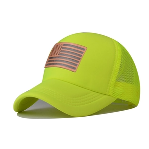 Detailed close-up of the breathable mesh design and American flag patch on the baseball cap
