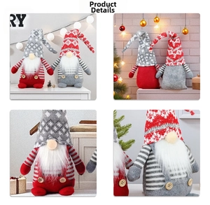 Detail of Christmas gnomes with knitted hats and white beards in festive holiday decor