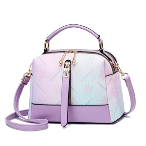Fashionable gradient purple and mint green pillow bag with floral pattern and gold hardware