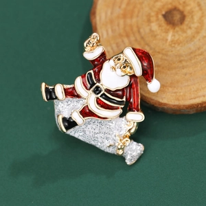 Fashionable Santa Claus brooch in red enamel with silver glitter and gold accents