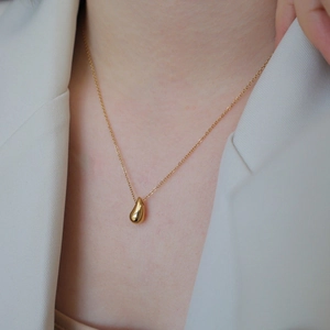 Minimalist gold titanium steel necklace with polished teardrop pendant for women