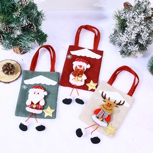 Three Christmas burlap gift bags featuring 3D Santa, Snowman and Reindeer with hanging legs