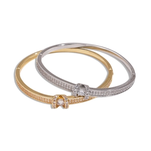 18K gold plated oval buckle bracelet with crystals in gold and silver finishes