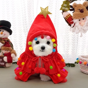 Festive red pet Christmas cloak with colorful pompoms and gold star for small dogs and cats