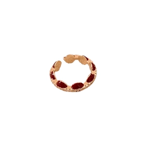 Elegant gold-plated wave ring with red enamel and shimmering cubic zirconia stones