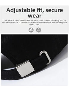 Detail of adjustable silver metal buckle on black cotton baseball cap for a secure fit