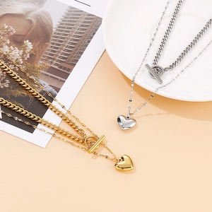 Double-layered gold and silver stainless steel necklace with heart pendant and T-bar clasp