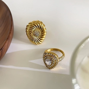Luxurious gold stainless steel spiral double ring with heart diamond and pavé stones