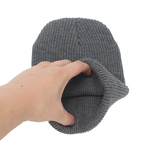 Elastic grey ribbed knit beanie for women showing stretchable warm material