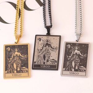 Detailed view of square tarot necklaces in gold, black, and silver for men and women