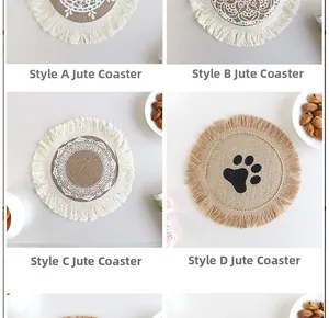 Detail of four handmade jute placemats with fringe and white mandala patterns
