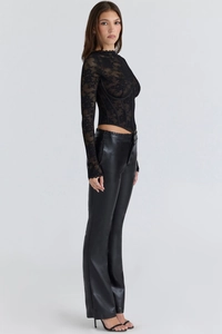 Side view of sexy black lace corset top with sheer sleeves and boning details