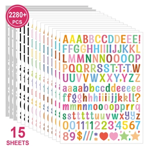 Detail view of 15 sheets containing 2280+ colorful alphabet and number stickers
