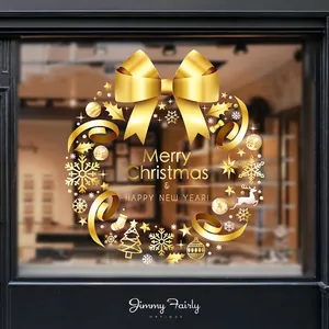 Golden Merry Christmas wreath window sticker with snowflakes and reindeer on glass display