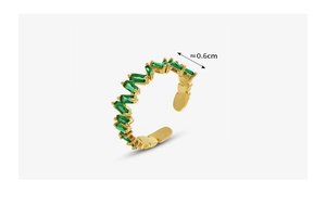 Detail shot showing 0.6cm width of gold ring with rectangle green crystal stones