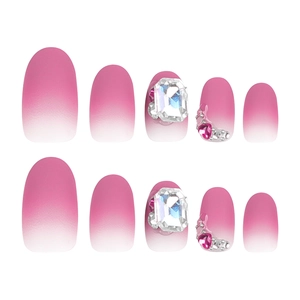Pink gradient short oval press-on nails with large square rhinestones and heart gems