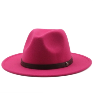 Detail of rose pink wool fedora hat featuring a leather band and vintage metal buckle