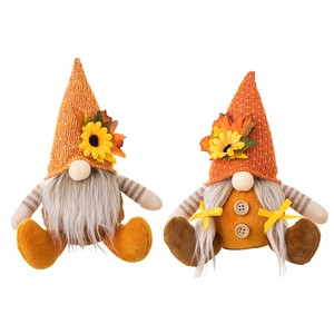 Pair of Thanksgiving gnome plush ornaments with knitted hats and sunflower decorations