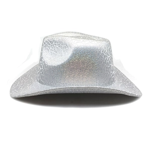 Detail of silver sequined cowboy hat with metallic crackle texture and reflective finish