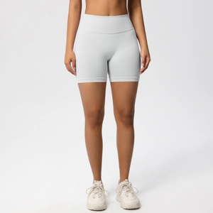 Detail of high-waist seamless fitness shorts in light grey with knitted stretch texture