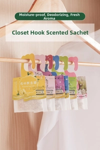 Detail of multi-colored hanging sachets on a wooden rack for wardrobe freshening