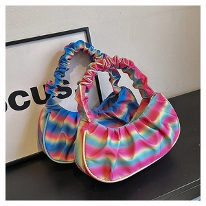 Close-up of the rainbow gradient pleated shoulder bag with smooth satin texture and soft finish
