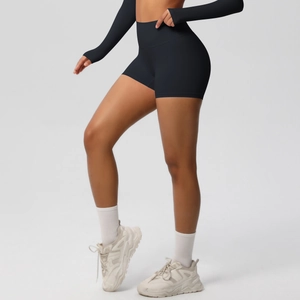 Close-up of black high-waisted fitness shorts with moisture-wicking fabric and booty lifting