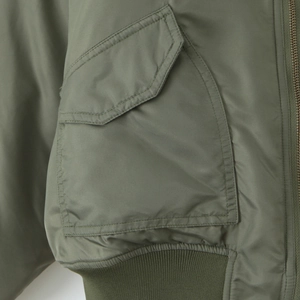 Army green vintage bomber jacket with classic lapel and ribbed cuffs for a chic casual style