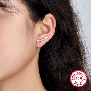 S925 sterling silver ear cuff with white zircons shown on a model's side profile