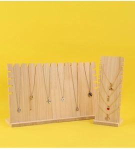 Detailed view of solid wood necklace display stands in horizontal and vertical styles
