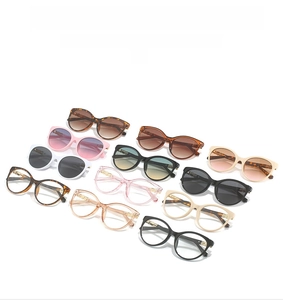 Collection of oversized fashion sunglasses in various colors with metal hollowed-out temples