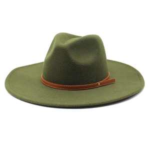 Detail of olive green wool fedora with brown leather band and small metal stud accent