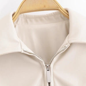 Chic cream white PU leather jacket with polo collar and metallic zipper detail