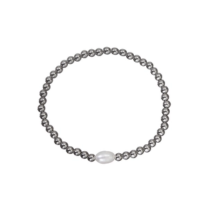 Polished stainless steel 4mm bead bracelet with a white freshwater pearl centerpiece