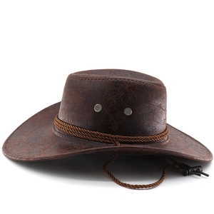Detail of vintage brown wide brim cowboy hat with braided rope and metal air vents