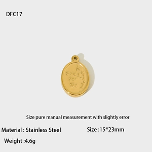 Detailed view of a gold-plated stainless steel oval pendant with Pray for Us engraving
