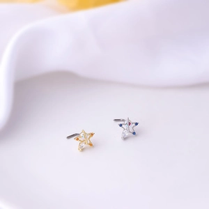 Star-shaped 20G titanium nose studs with colorful zircon crystals in gold and silver finish