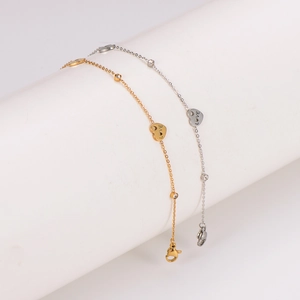 Elegant gold and silver heart charm anklets with LOVE engraving and crystal accents