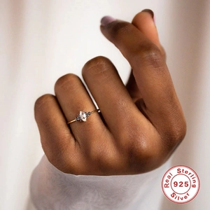 Luxurious S925 sterling silver marquise opal ring with black spinel accents on hand