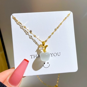Titanium steel apple pendant necklace with gold plated chain and white cat eye stone
