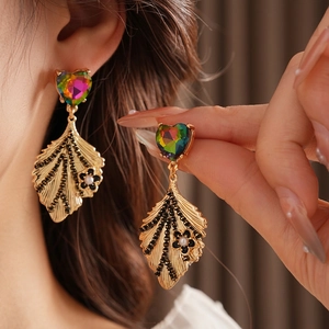 Vintage luxury gold leaf earrings with gradient heart stone and pearl floral details