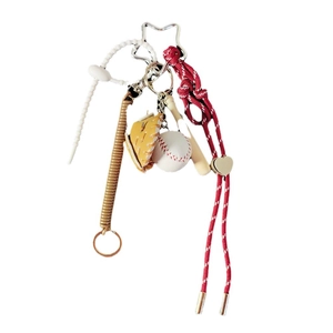 Baseball keychain with red braided rope, leather glove, and bat on white background