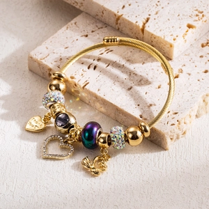 Bracciale regolabile con perline, ciondolo a cuore Thank You e ciondoli a cigno dorati
