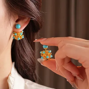 Boucles d'oreilles vintage fleur en résine avec perles turquoise et sphère dorée