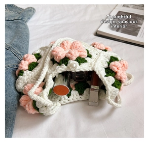 Macro detail of handmade crochet puffy flower bag showing interior storage capacity