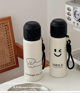 Minimalist white stainless steel thermos with cute puppy print and black carrying loop