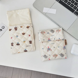 Quilted cotton pouches with cute bread dog and elephant patterns for small essentials
