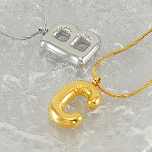 Chubby bubble initial pendant necklaces in gold and silver finish with sleek snake chains