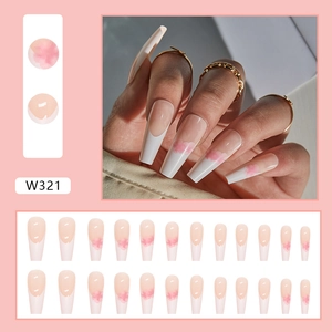 Detail showing long coffin press-on nails set with elegant pink watercolor French tips
