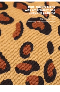 Close-up of leopard print corduroy fabric texture with detailed ribbed knit patterns